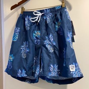 New with tags. Spicy Tuna men’s blue pineapple swim trunks. Size Medium.